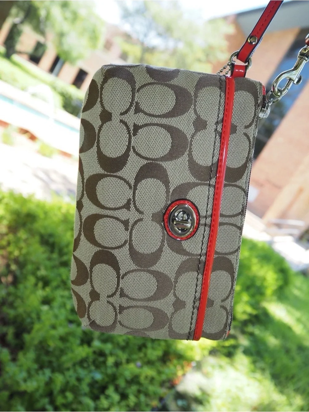 Coach Brown Signature Canvas Wristlet with Red Trim and Orange Tag  EUC
